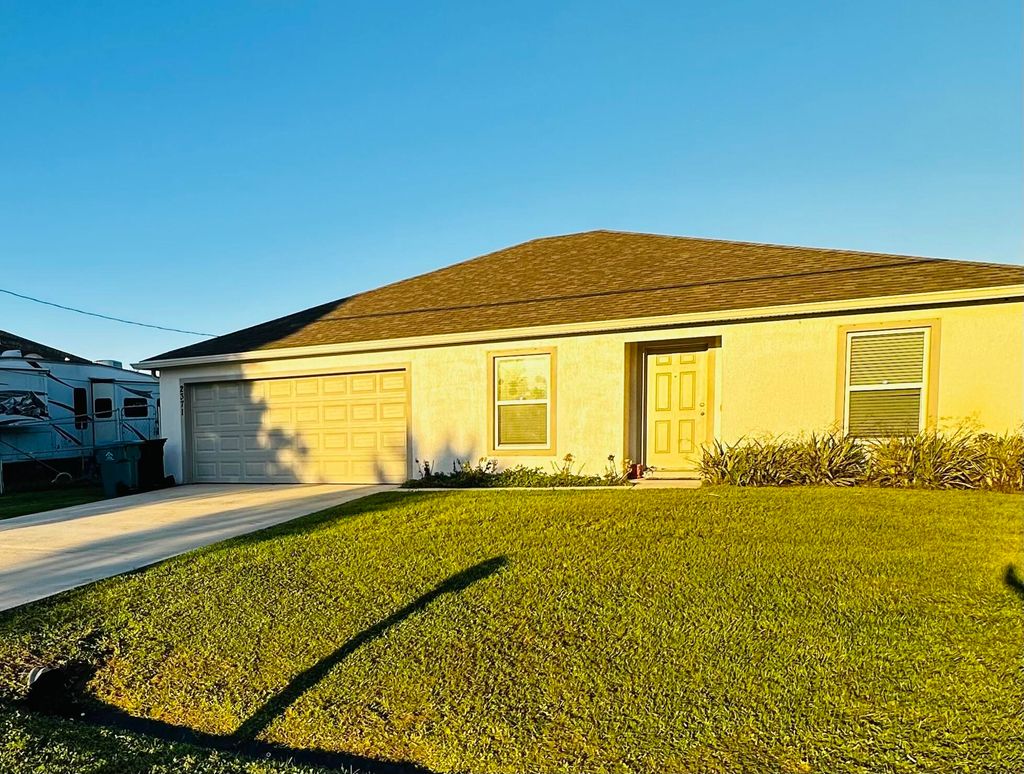 Photo of 2371 SW Chestnut Lane, Port Saint Lucie, FL 34953 (MLS # R10938539)