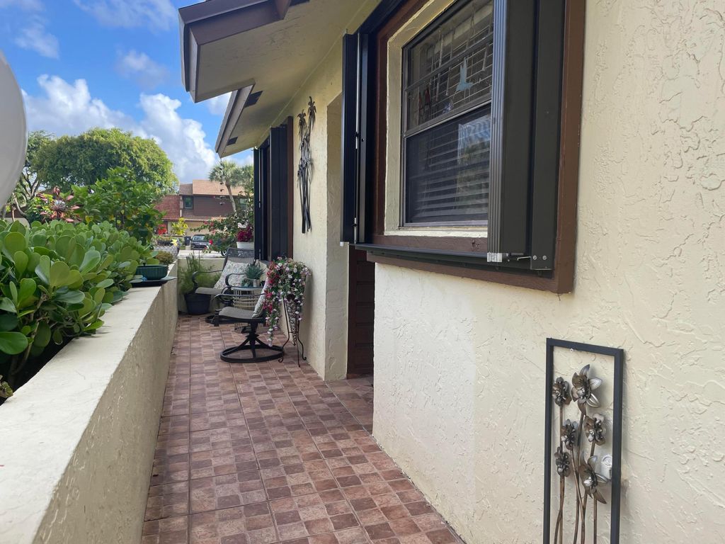 Photo of 4403 SE Rende Lane, Lake Worth, FL 33461 (MLS # B26018946)