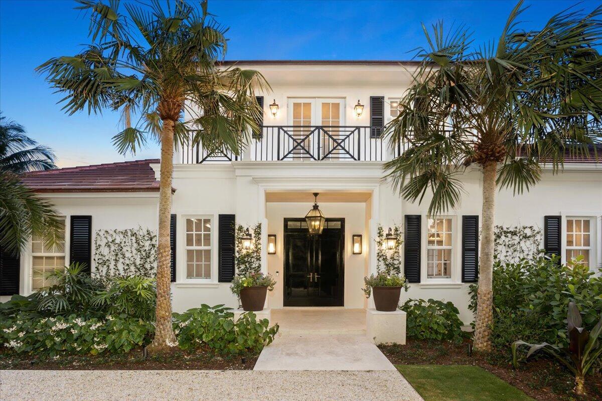 Just completed on an oversized lot, this five bedroom, 6.1 marble bath estate has ultra-high ceilings and spacious rooms throughout. A stately entry foyer, separate bar with 2 refrigerators, hardwood floors and recessed lighting throughout. Bright and light, every room has at least two walls of windows/doors. The primary suite has two luxurious bathrooms, large walk-in closets, and a generous private terrace. The kitchen has quality cabinetry and appliances and expands onto a spacious family room. The east side of the property has a wonderfully sized garden area, and the west aide has an outdoor loggia that is adjacent to the oversized pool/spa. Additionally, there is an elevator, storage, 2 laundry rooms, air-conditioned two car garage,