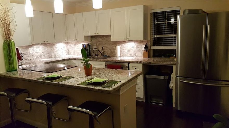 Beautifully updated 2 BR townhouse occupying 2nd and 3rd floors of complex. Open design, granite counters, high-end appliances and finishes. Located in quiet pocket of Wilton Manors but close to all of the fun and convenience. Available for move-in October 1, but showings available now with appointment.