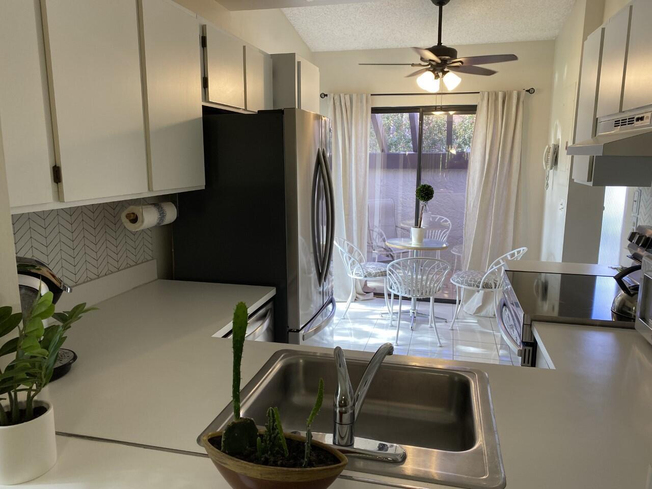 Simply furnished 2-bedroom, 2-bath villa in the 55+ community of Willow Bend in Lake Worth. This charming rental offers an open layout, updated kitchen with stainless steel appliances, and a bright, airy living space. Enjoy peaceful mornings on the screened-in patio overlooking lush landscaping. Primary suite features a walk-in closet and en-suite bath. Washer/dryer in unit. Community amenities include a pool, clubhouse, tennis, and walking paths. Conveniently located near shopping, dining, medical centers, and just a short drive to the beach. One tenant must be 55 or older. Annual lease terms considered. Perfect for anyone seeking a move-in ready unit, low-maintenance lifestyle in a safe, friendly and active adult community. Excellent location near turnpike, Publix shopping center close