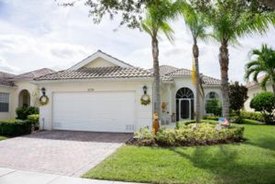 VERY NICELY APPOINTED AND VERY POPULAR OAKMONT MODEL IN DESIRABLE VILLAGEWALK IN WELLINGTON FLORIDA. THIS HOME HAS THE EXTENDED SCREENED IN PATIO, WIRED FOR GENERATOR POWER, HURRICANE ACCORDIAN SHUTTERS THROUGHOUT, BAMBOO FLOORS IN THE COMMON AREAS, GREAT LAKE VIEWS, NEW WATER HEATER, CENTRAL VACUUM, CROWN MOLDING AND CHAIR RAILS, LARGE LAUNDRY ROOM WITH SINK. VILLAGE WALK IS GATED AND HAS 2 OF THE NICEST POOLS AND CLUBHOUSES IN WELLINGTON. STATE OF THE ART FITNESS CENTER AND TENNIS.