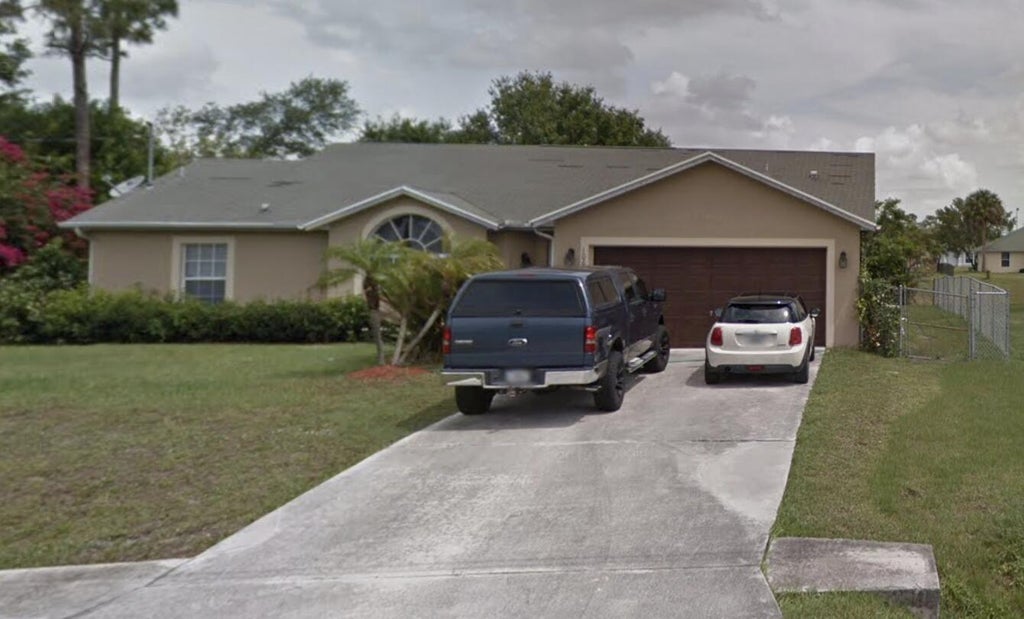 Photo of 1069 SW Jacqueline Avenue, Port St Lucie, FL 34953 (MLS # R10909654)