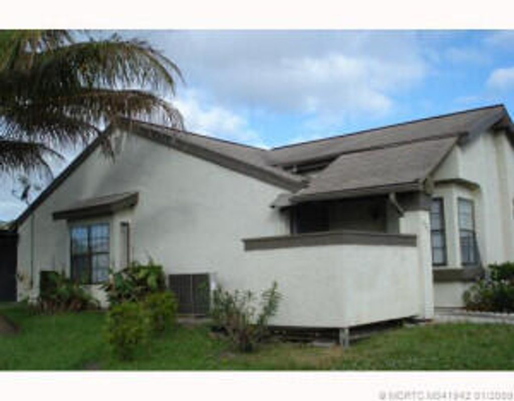 Photo of 602 SW Jeanne Street, Port Saint Lucie, FL 34953 (MLS # B26002610)