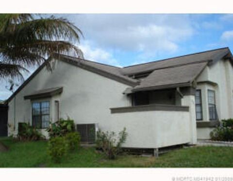 Photo of 602 SW Jeanne Street, Port Saint Lucie, FL 34953 (MLS # B26002610)