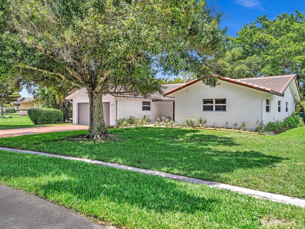 Photo of 11115 NW 37th Street, Coral Springs, FL 33065 (MLS # B26057104)