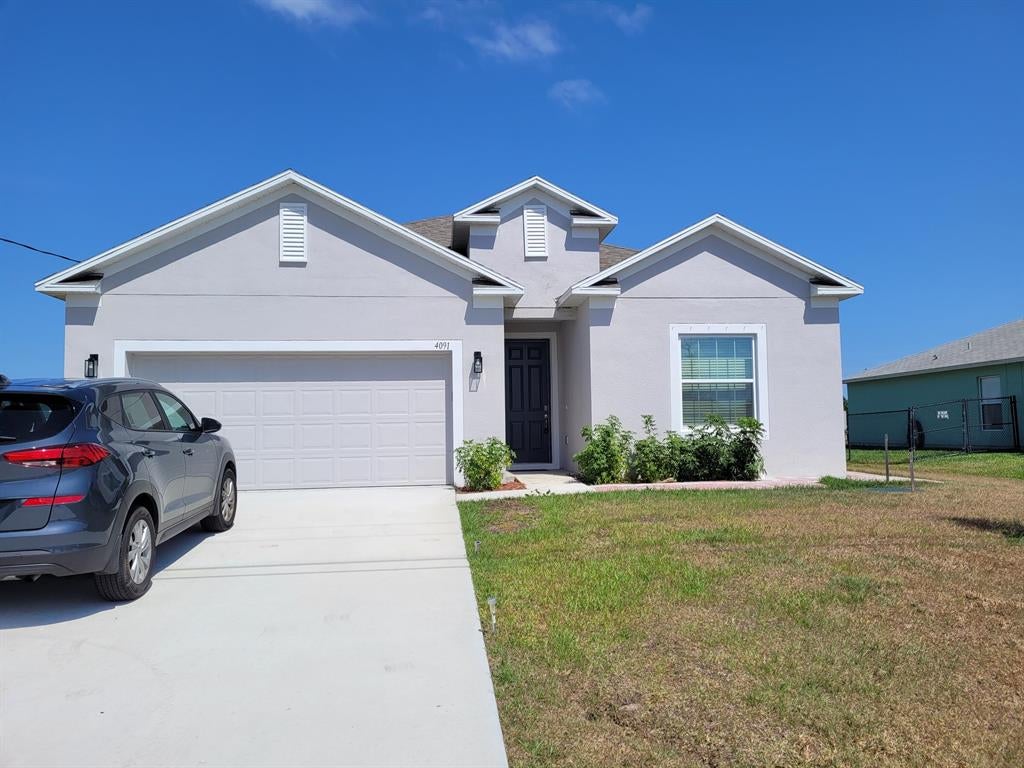 Photo of 4091 SW Mccrory Street, Port Saint Lucie, FL 34953 (MLS # R10793383)