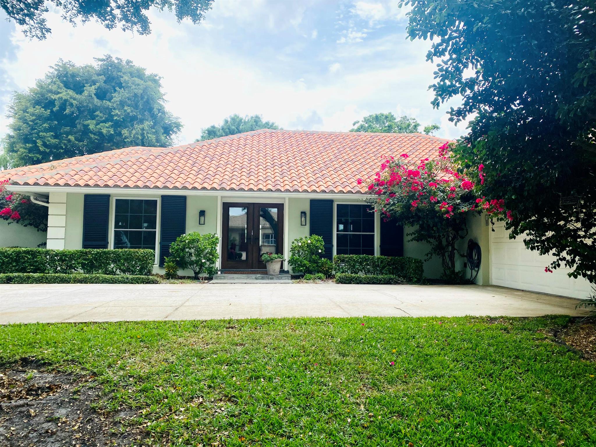 This neighborhood is the best kept secret in West Palm Beach! Enjoy this annual rental in the highly sought after Presidential Estates. This private gated community with 24 hour security and access to tennis courts is conveniently located near the Palm Beach Outlet mall, I95, Palm Beach Airport, and 10 minutes to downtown. This open floor plan house showcases a large kitchen, two family rooms, built in interior/ exterior sound system, hardwood floors, full hurricane impact windows, and a newly renovated primary bathroom.