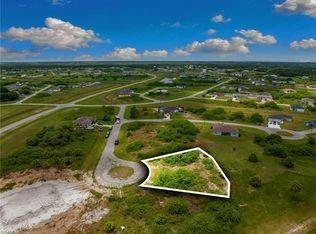 Opportunity awaits with this spacious 14,810 sq ft vacant lot located in the desirable Port LaBelle community. This oversized parcel offers plenty of room to build your dream home with space for outdoor living, a pool, or additional structures. Situated in a growing area with easy access to schools, parks, shopping, and dining. Enjoy the peaceful surroundings while still being close to the amenities of nearby towns. No HOA and utilities nearby make this an excellent investment or future homesite.