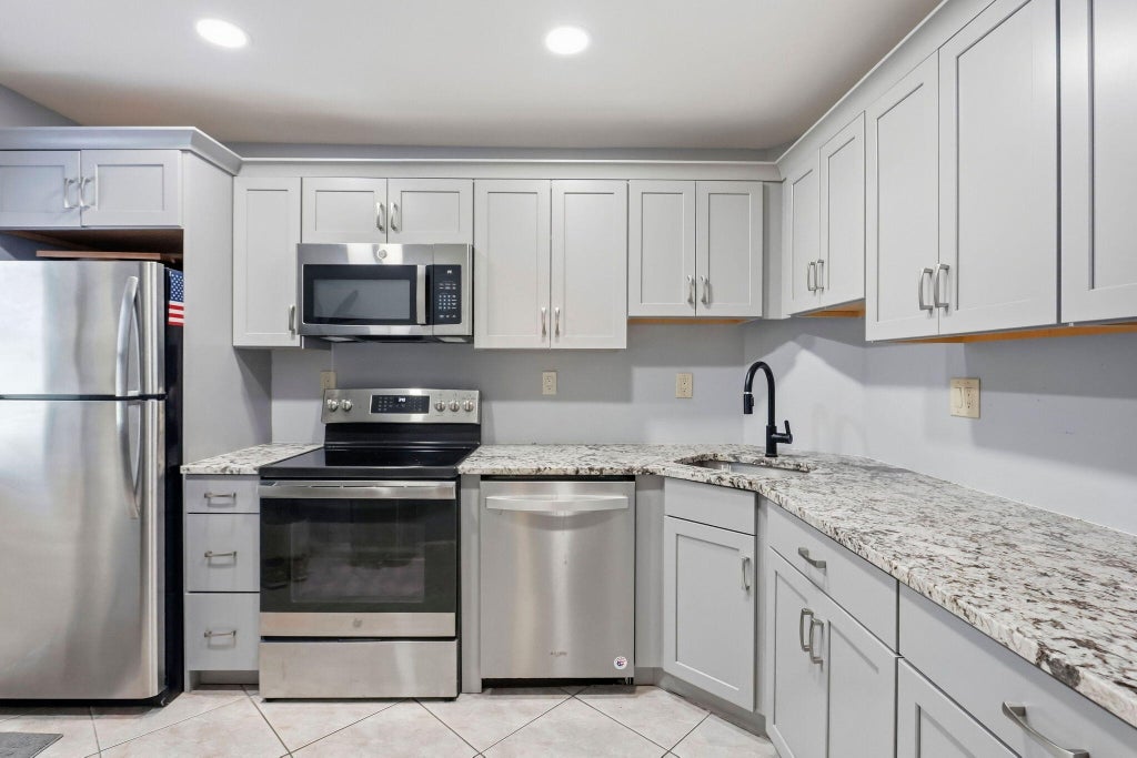 Photo of 800 E CAMINO REAL #312, Boca Raton, FL 33432 (MLS # B26082000)