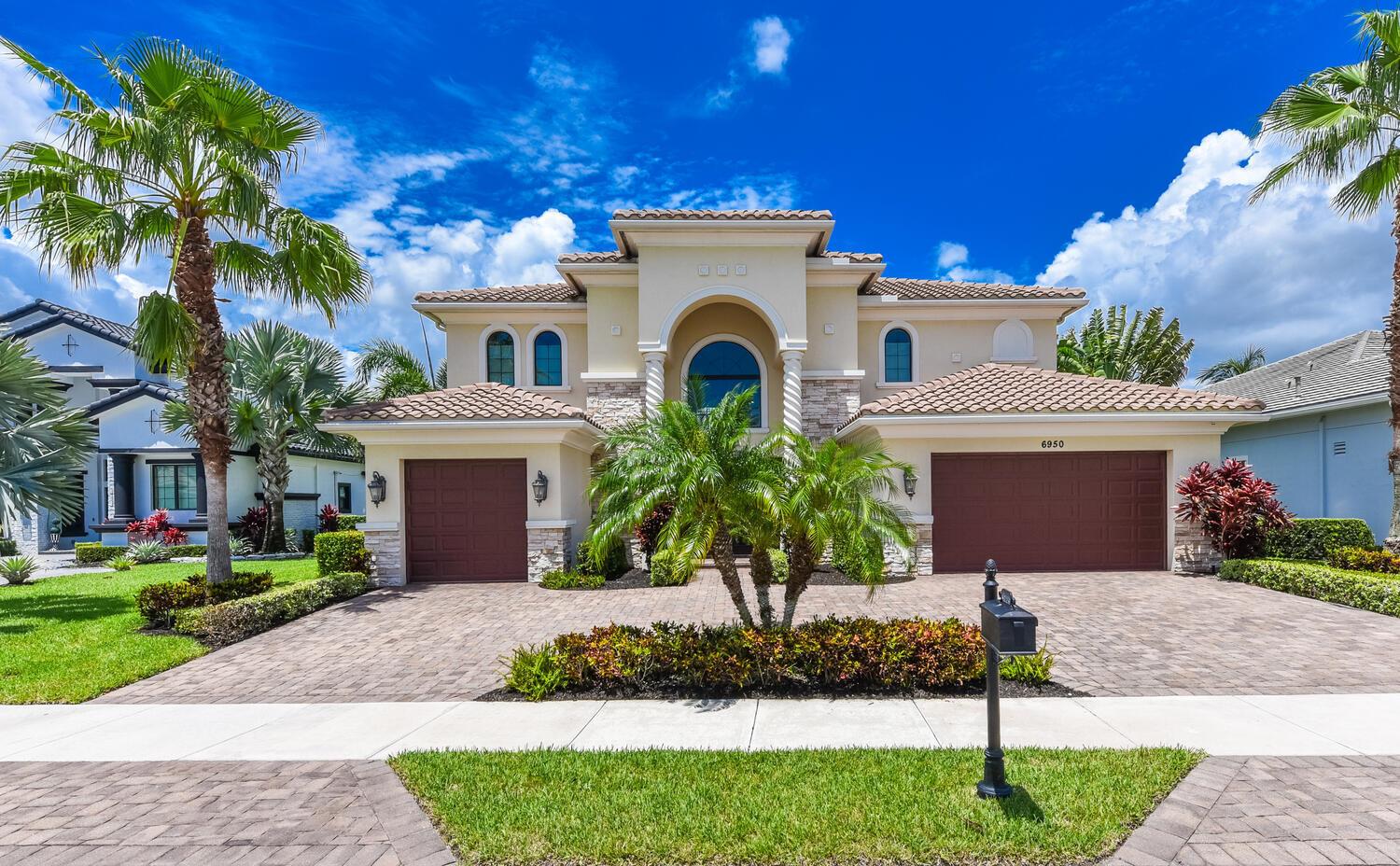 Fully furnished luxury rental in the prestigious gated Royal Palm Polo community, centrally located in Boca Raton. This expansive Ternbridge II model boasts a grand two-story foyer, elegant living and dining rooms with coffered ceilings, a spacious great room with soaring views of the lake and fountain, and a gourmet kitchen with top-tier appliances and casual dining area with rear staircase access. Upstairs, the lavish primary suite features dual walk-in closets and a spa-style bath. Additional highlights include loft, ensuite bedrooms, and first-floor laundry. Enjoy a sparkling pool overlooking the lake, just a short walk to the clubhouse, gym, tennis courts, and resort-style amenities. Experience refined, resort-style living in one of Boca's most sought-after neighborhoods.