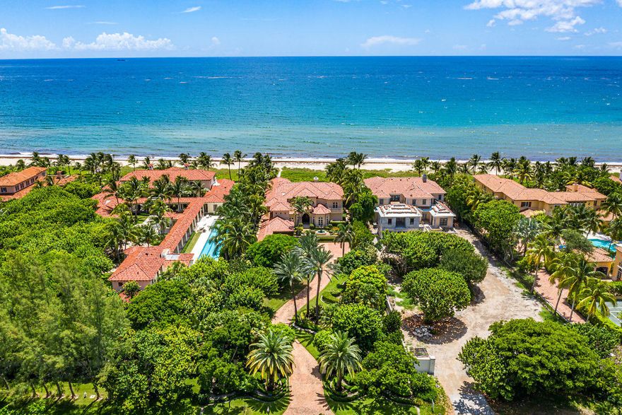 Tranquil and serene, this ultra-private oceanfront estate is nestled high above the sweeping dunes in the prestigious town of Gulf Stream. Sited on nearly one acre, 1555 North Ocean Blvd. reveals itself as one of the most distinguished properties in the estate section of Gulf Stream's oceanfront with over 400' in depth. Via the gated entry, the long drive winds through stately palms flanked by splendid tropical landscaping that leads to a motor courtyard complete with a four-car garage, exquisite garden fountain and a gracious front entry. Offering over 10,400 sqft this 6BB, 7.2 BA estate features a sense of timeless and elegant style. Originally built in 2001, architectural improvements include a new roof in 2017 and Tischler Windows.  Designed for entertaining, a dramatic oceanside