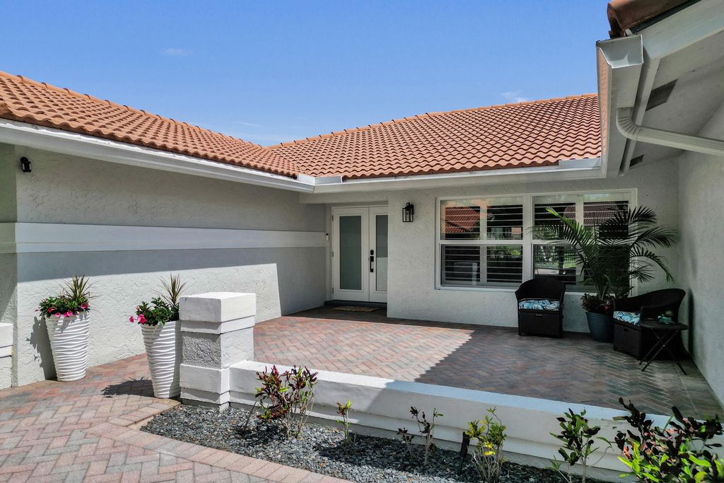 Photo of 5273 NW 89th Drive, Coral Springs, FL 33067 (MLS # B26007357)