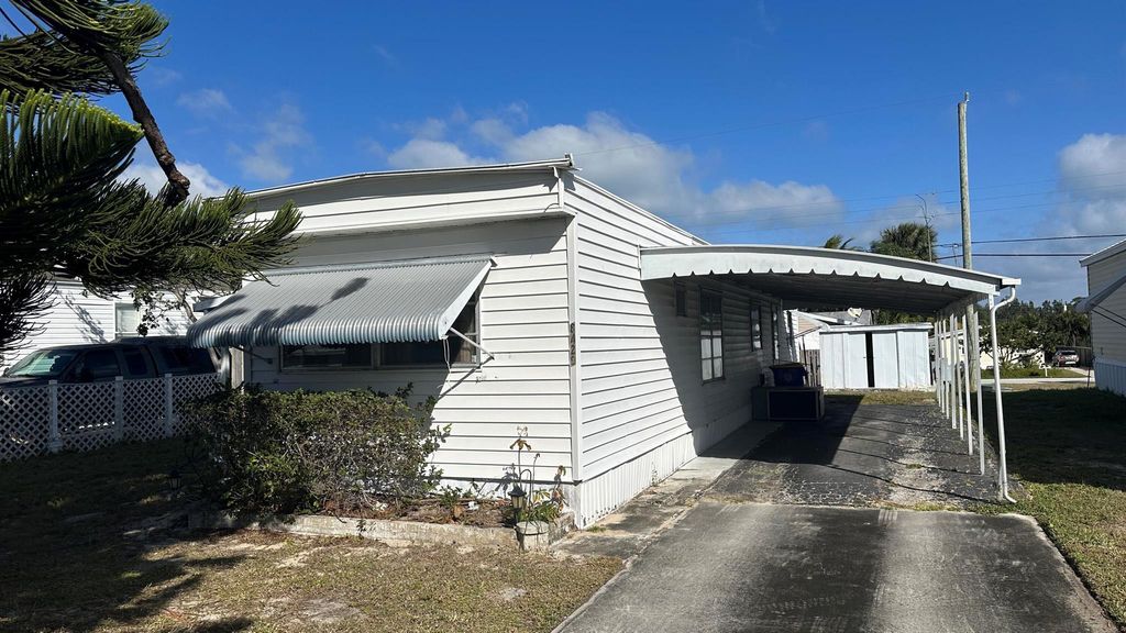 Photo of 8429 SE Eagle Avenue, Hobe Sound, FL 33455 (MLS # R11051107)