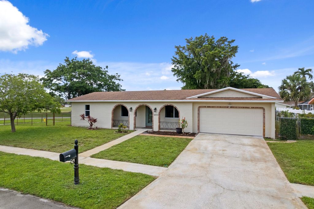 Photo of 4100 NW 7th Street, Coconut Creek, FL 33066 (MLS # B26043461)