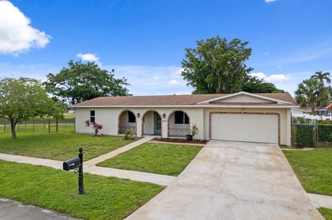 Photo of 4100 NW 7th Street, Coconut Creek, FL 33066 (MLS # B26043461)