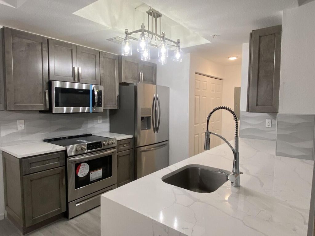 Photo of 2807 Veronia Drive #102, Palm Beach Gardens, FL 33410 (MLS # R10907609)