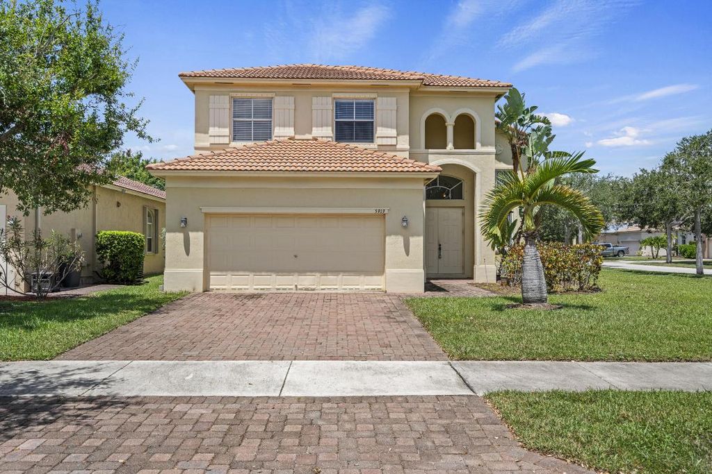 Photo of 5919 Walnut Park Lane, Fort Pierce, FL 34951 (MLS # R11119659)