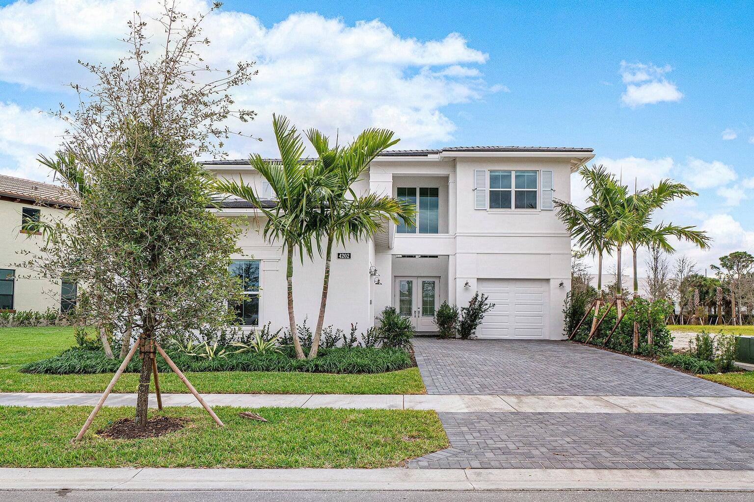 ANNUAL UNFURNISHED RENTAL-Absolutely Stunning CBS 2020 Built, 5000+ Living Sq Ft, 5 Bedroom, 5.1 Bathroom, 3 Car Garage Home in Alton Located in the Heart of Palm Beach Gardens. Step Inside This Beautiful Home exuding High Volume Coffered Ceilings, Gorgeous 42'' White Shaker Style Wood Kitchen Cabinetry With Extra Upper Cabinets, 3'' White Quartz Counter Tops, Subway Tile Back Splash, Stainless Steel Hood & SS Appliances, Gas Stove, Large Dining Room Perfect To Entertain Family & Friends, Great Family Room & Breakfast Area, The Master Bedroom Is On The Main Floor Offering a Large Ensuite Bathroom with Soaker Tub & Spacious Glass Shower, Master Walk In Closet Is Finished With California Closet Organizers & Includes a Storage Closet.