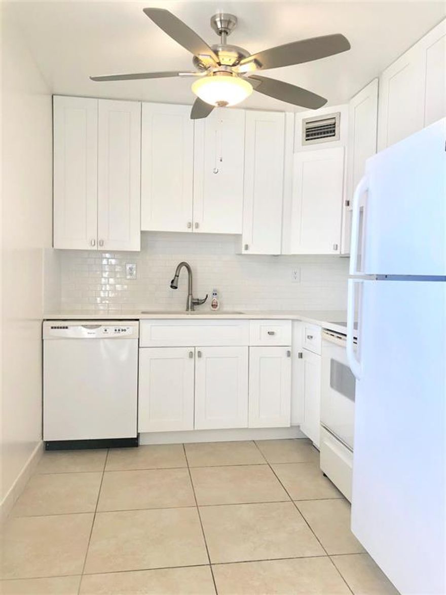 Highly Motivated Seller, Fresh coat of paint throughout entire apartment. Move in Condition. Updated kitchen and bathrooms, tile throughout the entire apartment. Plenty of kitchen cabinets space. End unit facing North. Morning sun rises can be enjoyed from lanai. Enjoy South Florida where the sun is always shining and the waves are always constant. Just a short drive to beach.  2010 A/C with 2011 WH
Indoor/Outdoor Swimming Pools, Tennis Courts, Two 18-Hole Golf Courses, & Multi-Million dollar Clubhouse.