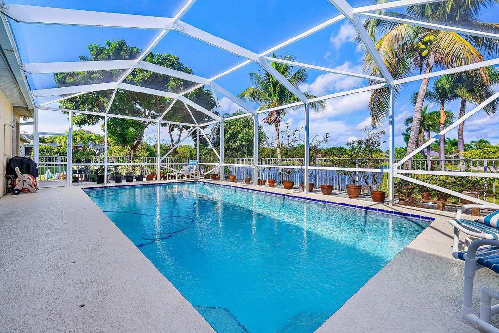 Photo of 511 NW Ember Way, Jensen Beach, FL 34957 (MLS # R10951715)