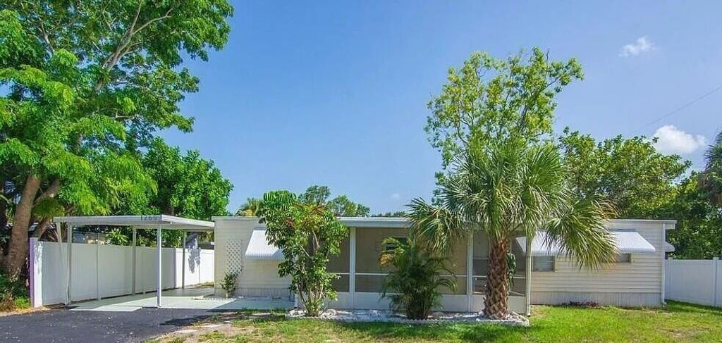 Photo of 1260 NE Olive Street, Jensen Beach, FL 34957 (MLS # R11110760)