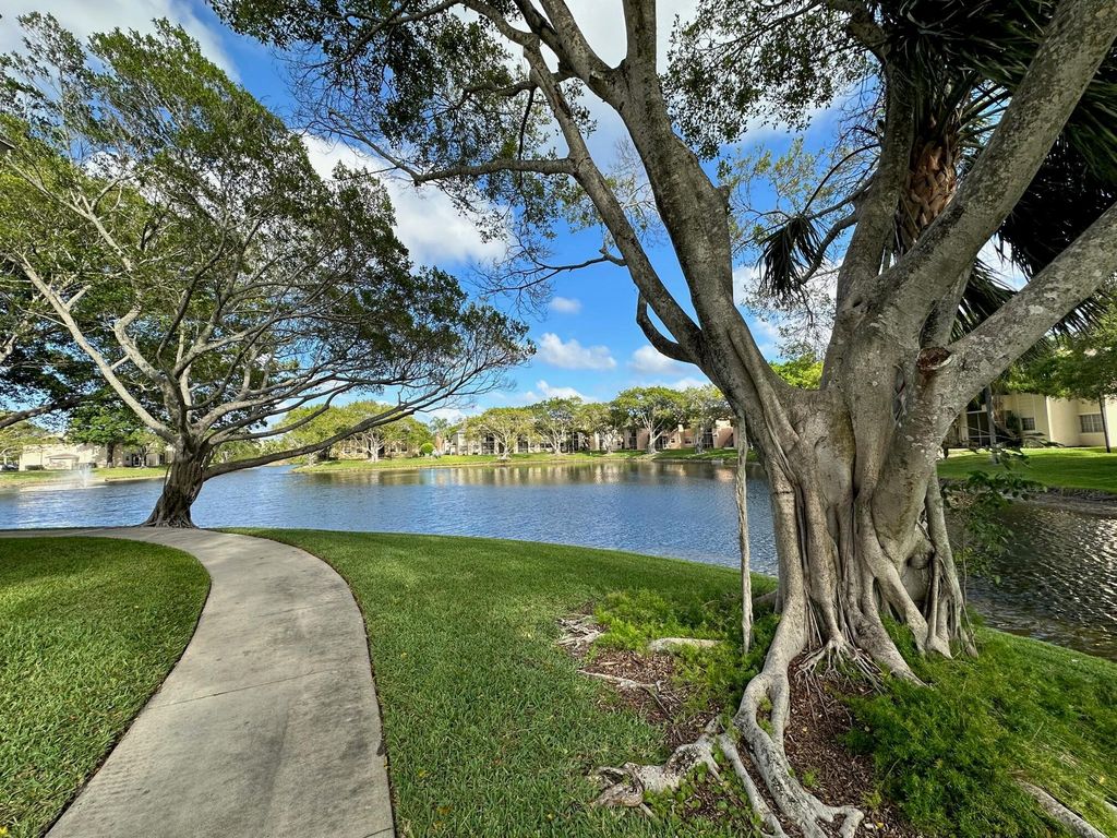 Photo of 720 Cypress Lane #K, Deerfield Beach, FL 33064 (MLS # R11114009)