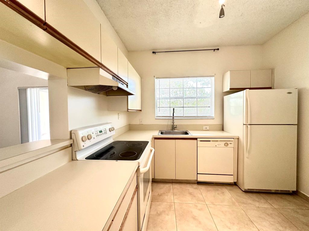 Photo of 720 Cypress Lane #K, Deerfield Beach, FL 33064 (MLS # R11114009)