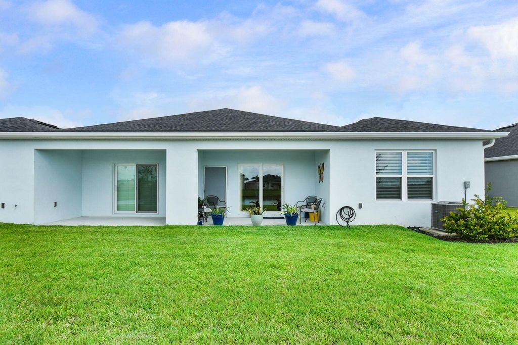 Photo of 9491 SW Libertas Way, Port Saint Lucie, FL 34987 (MLS # R11044469)