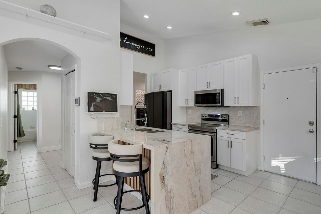 Photo of 1021 Fosters Mill Road, Boynton Beach, FL 33436 (MLS # R11141854)