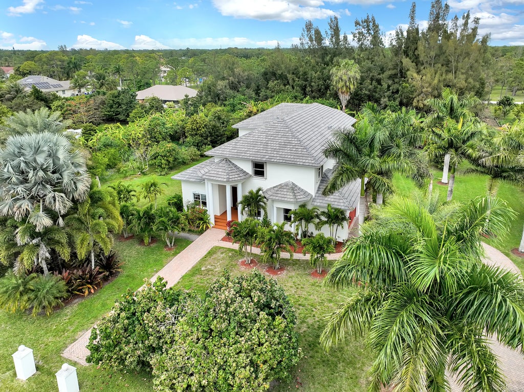Photo of 12121 70th Place N, West Palm Beach, FL 33412 (MLS # R10818236)