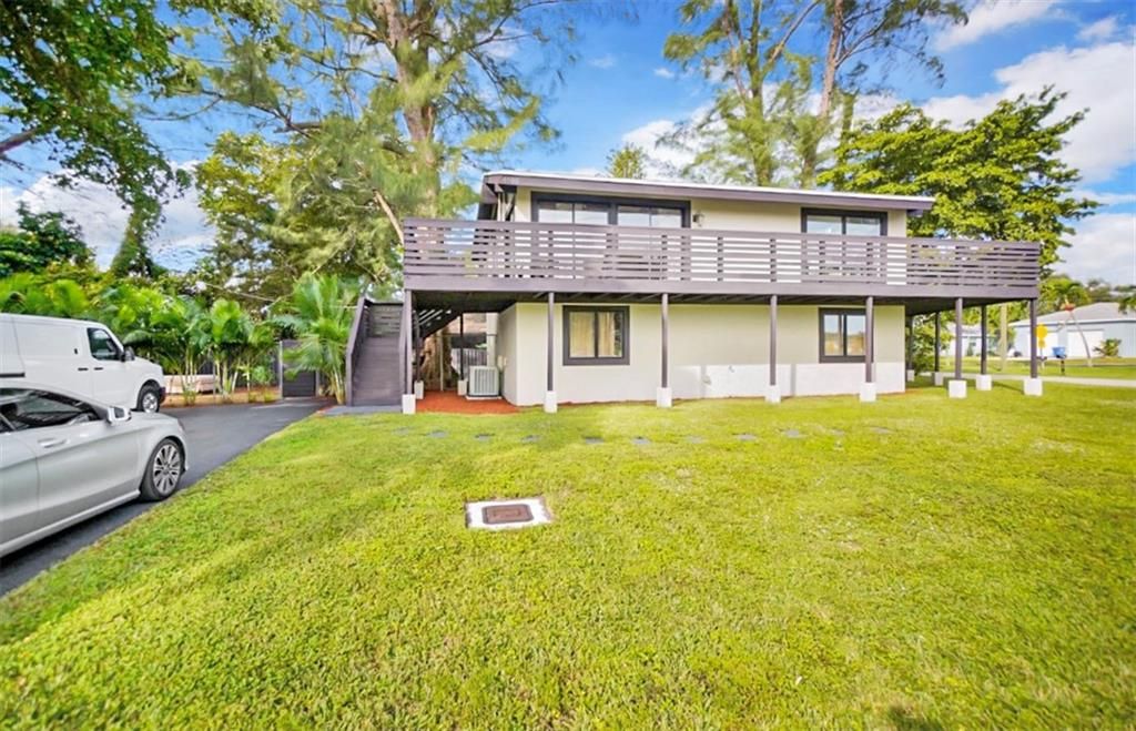 Photo of 4800 NW 77th Ct, Pompano Beach, FL 33073 (MLS # F10307556)