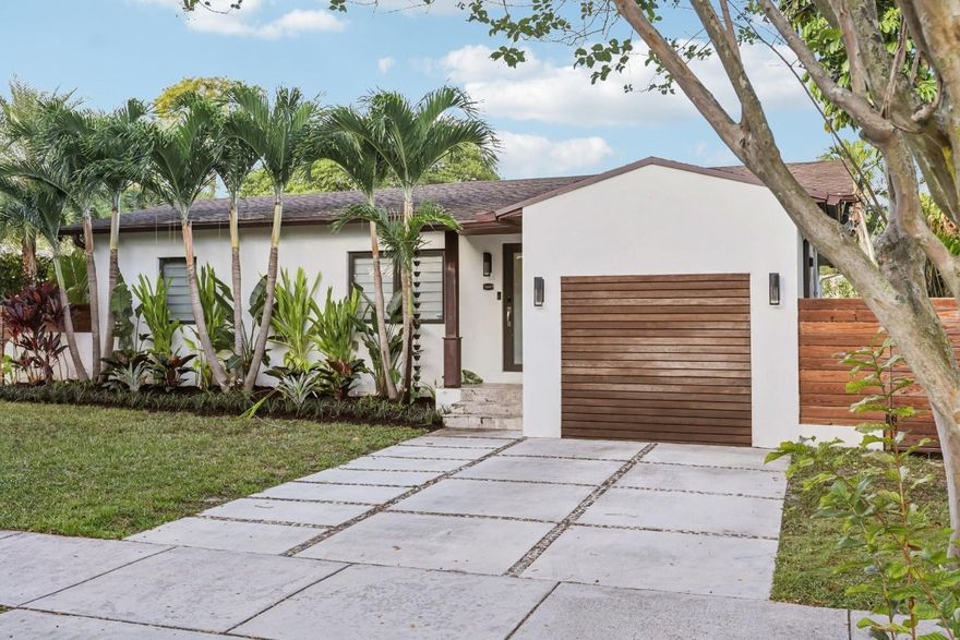 Stunning home in the highly sought-after and historic Coral Gate neighborhood. Enjoy exceptional walkability to Miracle Mile, along with nearby dining and shopping to fit any lifestyle.The home was FULLY renovated in 2019, featuring a new roof, updated plumbing, high-impact windows, and major system upgrades. The property includes a grandfathered, luxury detached in-law suite, fully permitted with its own kitchen, bathroom, and separate AC—ideal for guests, a home office, or extended family plus a converted garage flex space!Resort-style backyard designed for entertaining, complete with a full outdoor BBQ kitchen, Pergola with fans and a heated saltwater pool to enjoy year-round. A rare opportunity to own a truly turn-key home in one of Miami's most desirable neighborhoods.