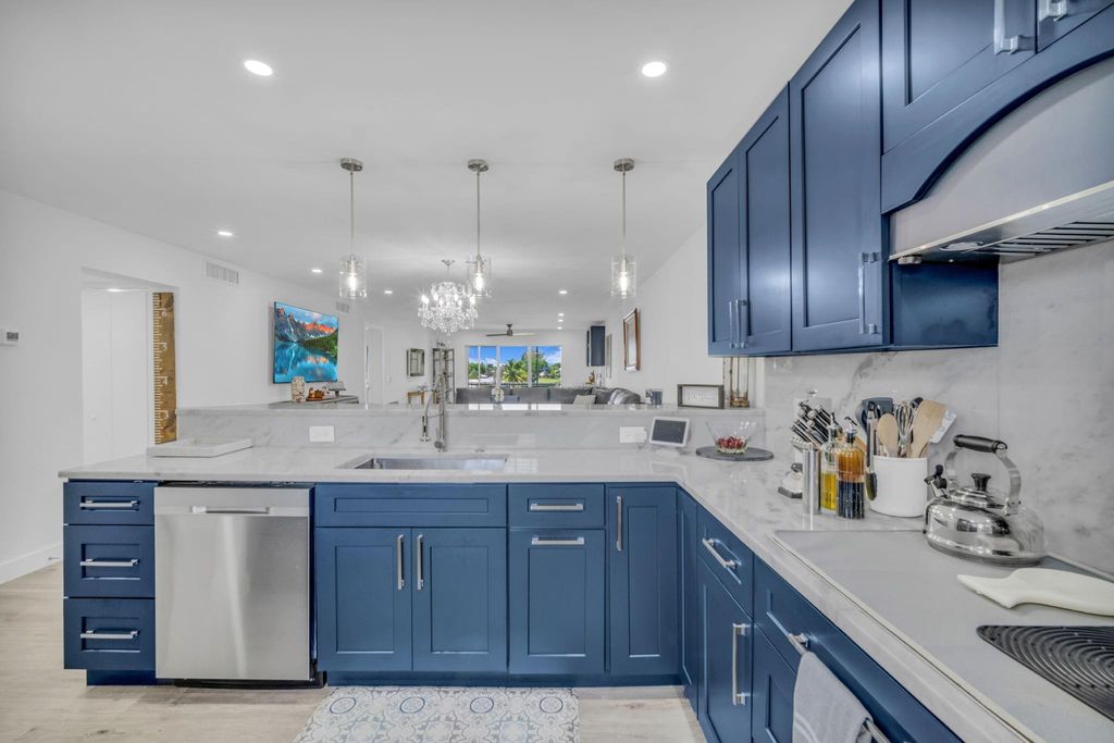 Photo of 250 John F Kennedy Drive #403, Atlantis, FL 33462 (MLS # F10518022)