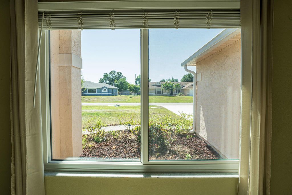 Photo of 537 SW Dauphin Avenue, Port Saint Lucie, FL 34953 (MLS # R11072072)