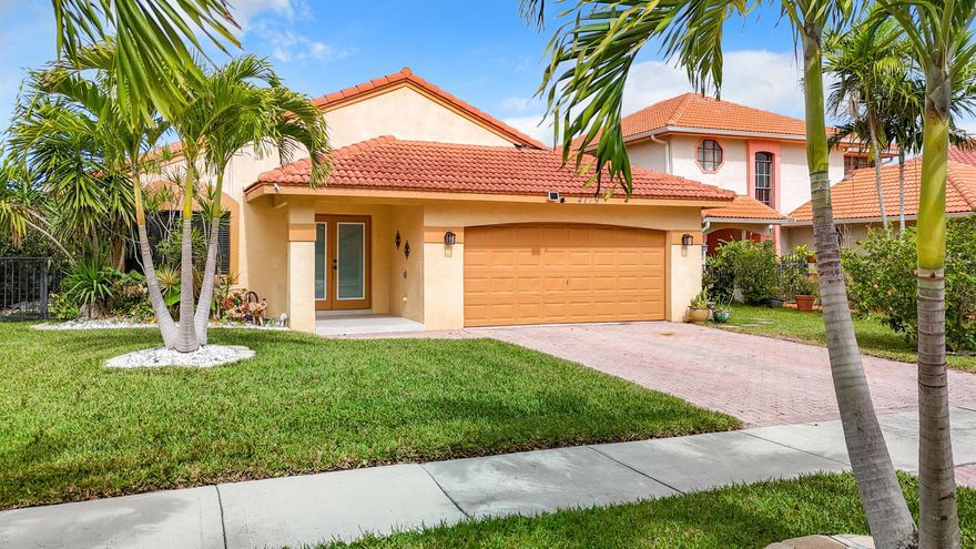 Welcome to this beautifully updated single-family home built in 1998, One of the last homes in this development to be built, where modern design meets relaxed South Florida living. Step inside to find a bright, open floor plan, stylish finishes, and updates throughout -- perfect for today's lifestyle.Interior was recently fully renovated in 2023. All new appliances, brand new tankless water heater, brand new A/C, and Impact windows and doors.Step outside to your private backyard retreat -- complete with a 2023 above-ground, removable pool featuring soothing jets and a jacuzzi. Enjoy the luxury of a spa-like experience. SELLER WILL REMOVE POOL AND JACUZZI IF REQUESTED