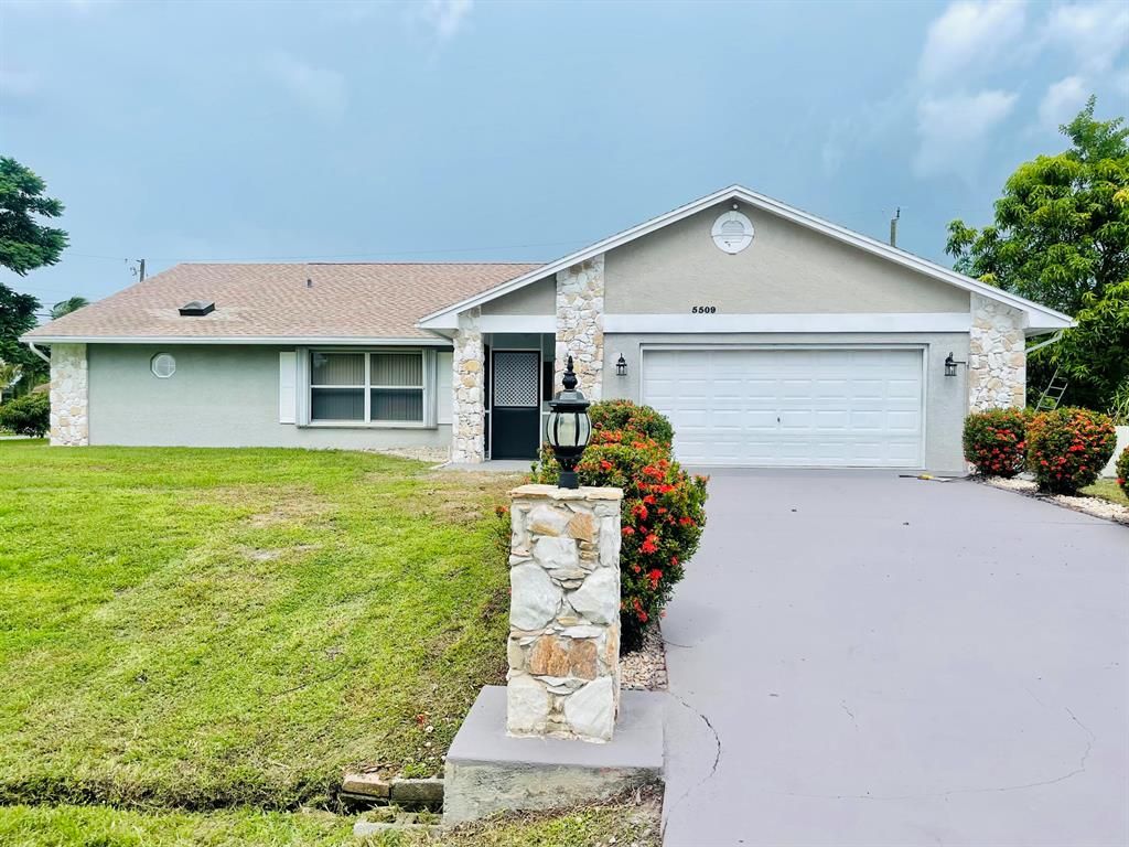 Photo of 5509 NW Evanston Avenue, Port Saint Lucie, FL 34983 (MLS # R10747762)