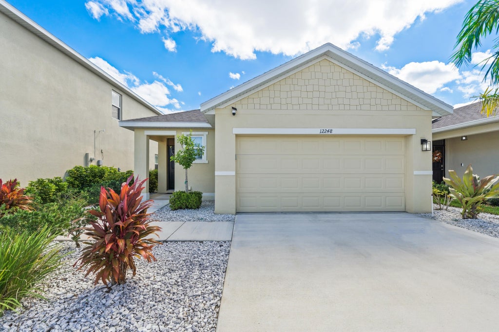 Photo of 12248 Rimini Way, Port Saint Lucie, FL 34987 (MLS # B26092575)