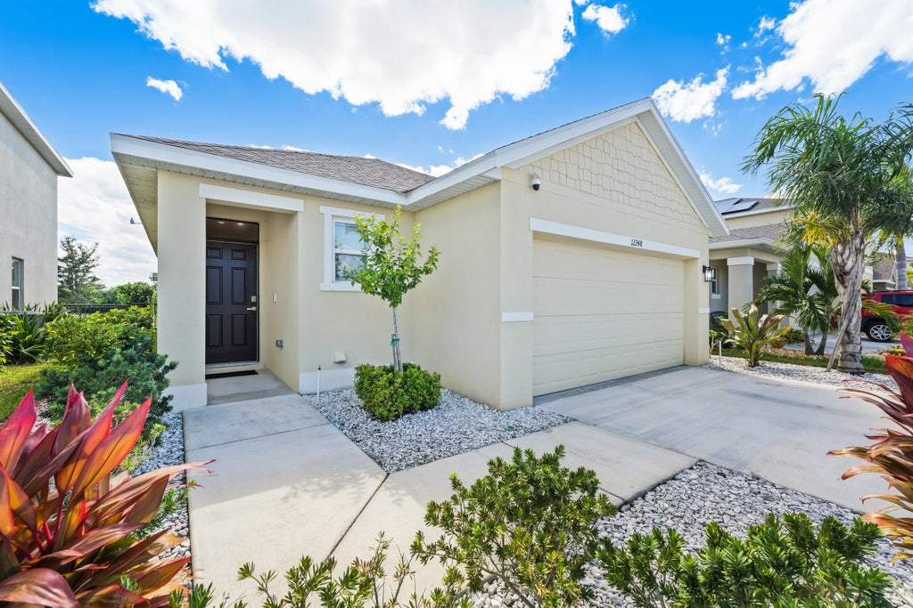 Photo of 12248 Rimini Way, Port Saint Lucie, FL 34987 (MLS # B26092575)