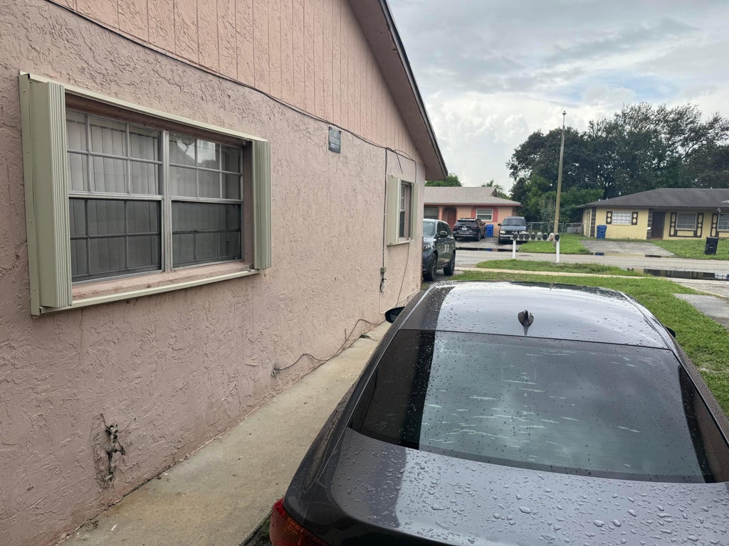 Photo of 1471 NW 22ND Street #A, Fort Lauderdale, FL 33311 (MLS # B26080160)