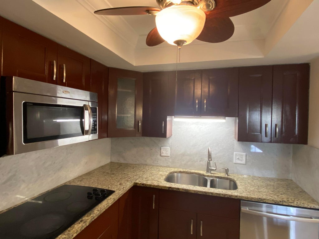 Photo of 4477 Oak Terrace Drive, Greenacres, FL 33463 (MLS # B26063357)