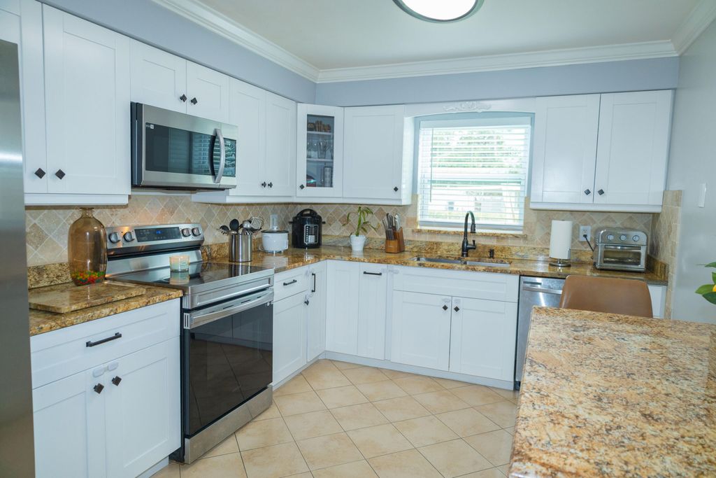 Photo of 411 Forest Estate Drive, West Palm Beach, FL 33415 (MLS # R11108184)