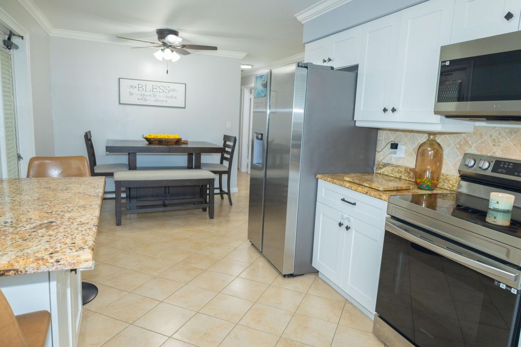 Photo of 411 Forest Estate Drive, West Palm Beach, FL 33415 (MLS # R11108184)