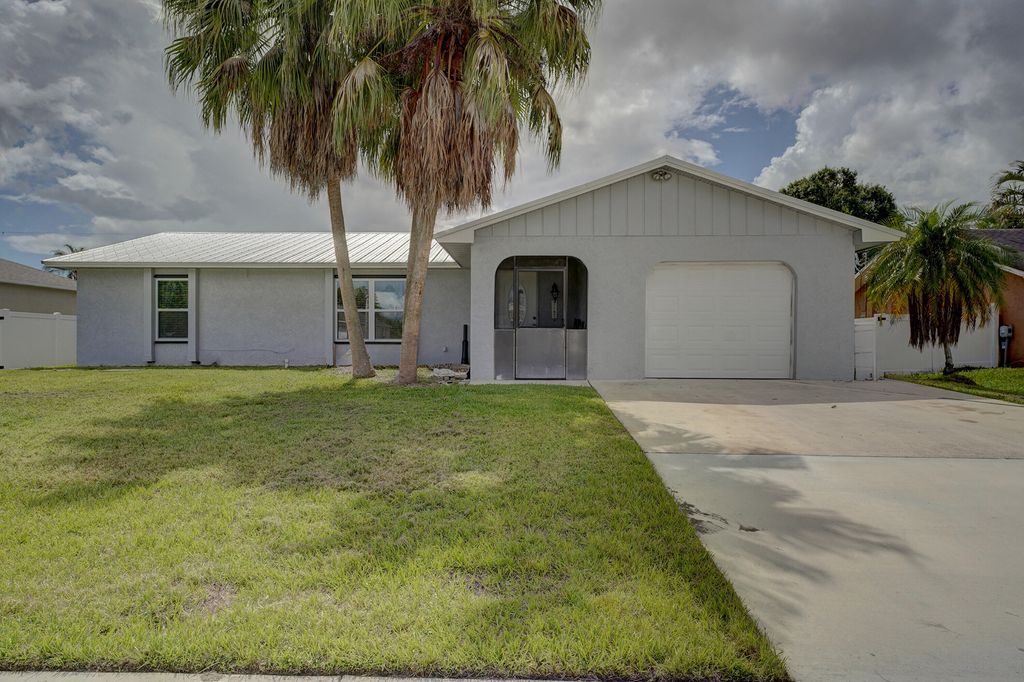 Photo of 1917 SE Floresta Drive, Port Saint Lucie, FL 34983 (MLS # R10999907)