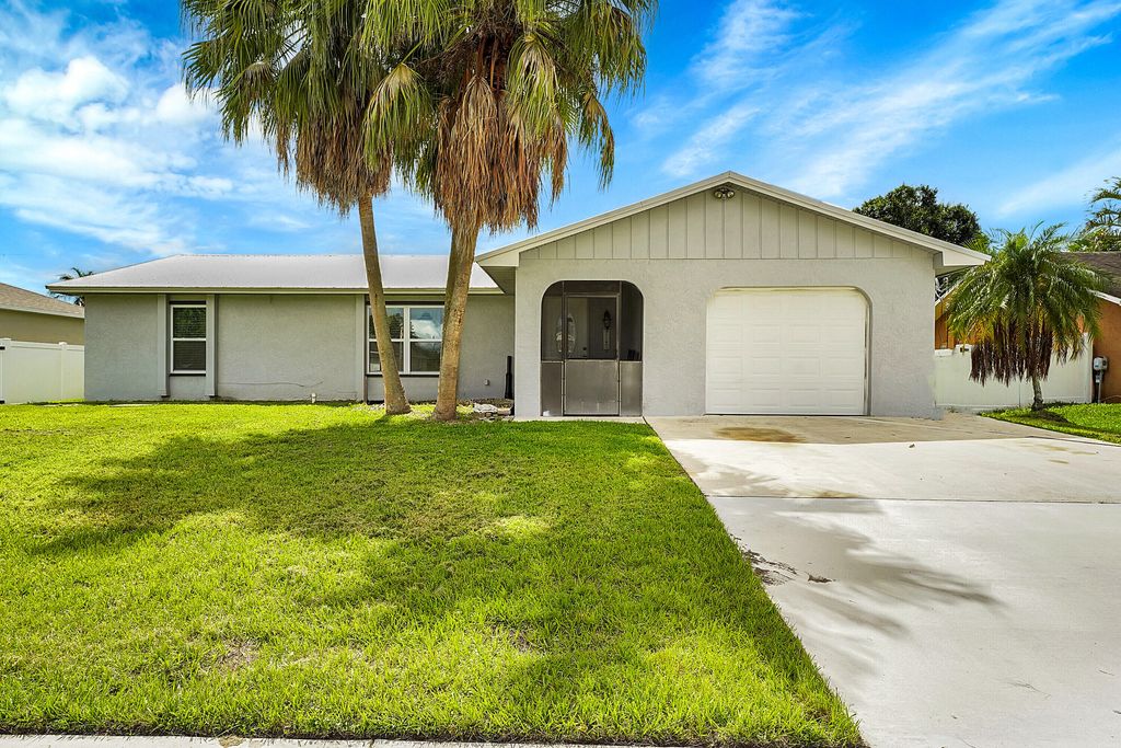 Photo of 1917 SE Floresta Drive, Port Saint Lucie, FL 34983 (MLS # R10999907)