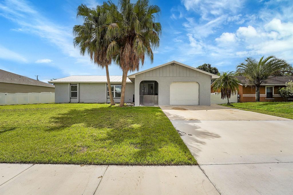 Photo of 1917 SE Floresta Drive, Port Saint Lucie, FL 34983 (MLS # R10999907)