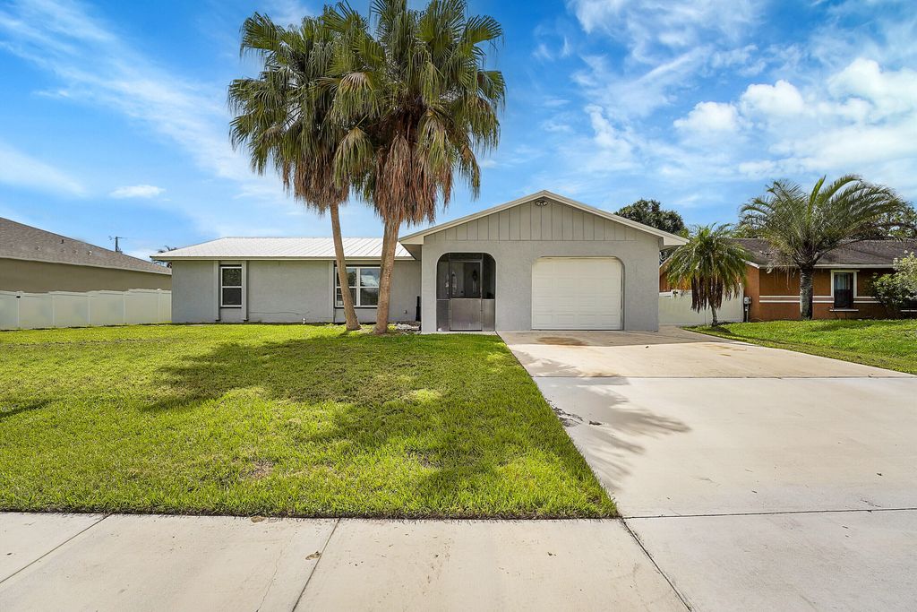 Photo of 1917 SE Floresta Drive, Port Saint Lucie, FL 34983 (MLS # R10999907)