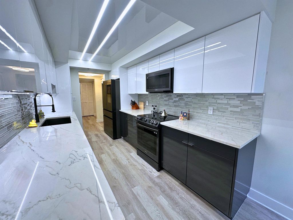 Photo of 20080 Boca West Drive #414, Boca Raton, FL 33434 (MLS # R11038621)