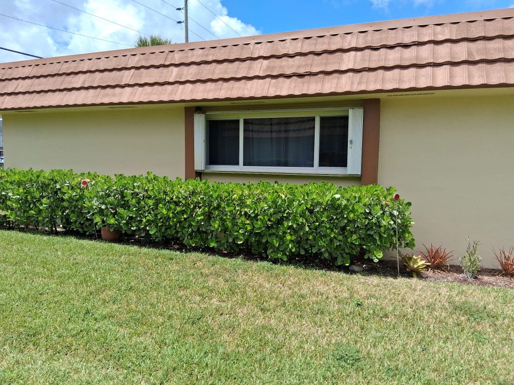 Photo of 5730 E Fernley Drive E #55, West Palm Beach, FL 33415 (MLS # B26064299)
