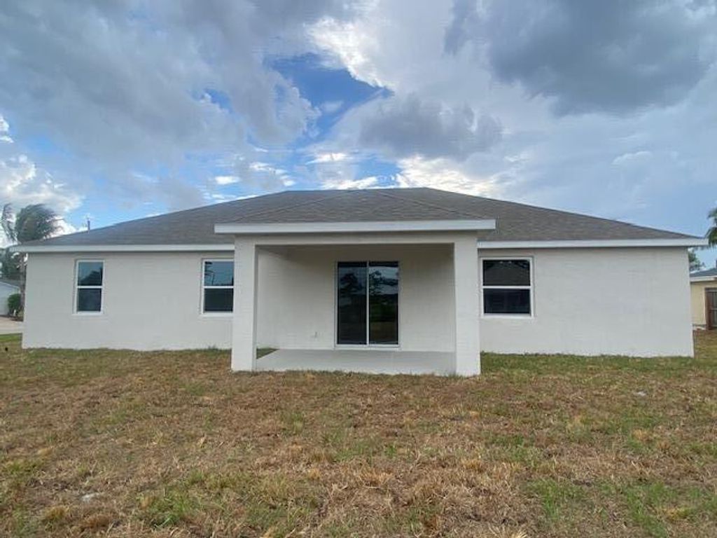 Photo of 483 SE Sunnydale Lane, Port St Lucie, FL 34983 (MLS # R11040818)